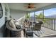Relaxing screened balcony with wicker furniture at 14271 Heritage Landing Blvd # 1526, Punta Gorda, FL 33955
