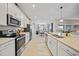 Modern kitchen with stainless steel appliances at 14271 Heritage Landing Blvd # 1526, Punta Gorda, FL 33955