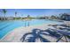Resort-style pool with lounge chairs and a poolside bar at 14271 Heritage Landing Blvd # 1526, Punta Gorda, FL 33955