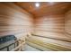 Relaxing wooden sauna with comfortable benches and a heater at 14271 Heritage Landing Blvd # 1526, Punta Gorda, FL 33955