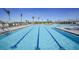 Resort-style swimming pool with plenty of lounge chairs at 14271 Heritage Landing Blvd # 1526, Punta Gorda, FL 33955