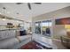 Living area with view of the back patio and serene nature at 14271 Heritage Landing Blvd # 1526, Punta Gorda, FL 33955
