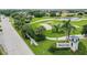 Aerial view of community entrance with signage at 14271 Heritage Landing Blvd # 1526, Punta Gorda, FL 33955