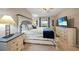 Main bedroom with large bed, plenty of closet space and TV at 14271 Heritage Landing Blvd # 1526, Punta Gorda, FL 33955