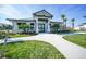 Community clubhouse with landscaping and walkway at 14271 Heritage Landing Blvd # 1526, Punta Gorda, FL 33955