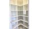 Spacious pantry features generous shelving, offering ample storage space for all your needs at 14271 Heritage Landing Blvd # 1526, Punta Gorda, FL 33955