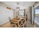Charming dining room with wood table and four chairs at 14271 Heritage Landing Blvd # 1526, Punta Gorda, FL 33955