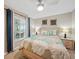 Bedroom with king-size bed and access to balcony at 14271 Heritage Landing Blvd # 1526, Punta Gorda, FL 33955
