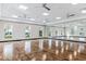Yoga studio with hardwood floors and large mirrors at 16402 Bridle Ridge St, Port Charlotte, FL 33953