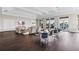 Spacious clubhouse with seating areas, large windows, and a view of the pool at 16402 Bridle Ridge St, Port Charlotte, FL 33953