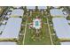 Aerial view of condo community with pool and lush landscaping at 2000 Bal Harbor Blvd # 321, Punta Gorda, FL 33950