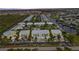 Aerial view of the community featuring waterways, lush landscaping, and a pool at 2000 Bal Harbor Blvd # 321, Punta Gorda, FL 33950