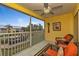Relaxing balcony with comfortable seating and views of the surrounding greenery at 2000 Bal Harbor Blvd # 321, Punta Gorda, FL 33950