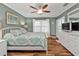 Inviting bedroom with a white bed frame, soft bedding, and natural light at 2000 Bal Harbor Blvd # 321, Punta Gorda, FL 33950