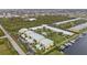 Wide aerial showcasing community, landscaping and water access at 2000 Bal Harbor Blvd # 321, Punta Gorda, FL 33950