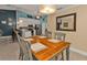 Dining area with kitchen view and wood table at 2000 Bal Harbor Blvd # 321, Punta Gorda, FL 33950