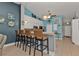 Bright kitchen bar area with stainless steel appliances and pendant lighting at 2000 Bal Harbor Blvd # 321, Punta Gorda, FL 33950