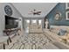 Bright living room featuring stylish furniture, a patterned rug, and sliding doors to a screened porch for indoor-outdoor living at 2000 Bal Harbor Blvd # 321, Punta Gorda, FL 33950