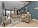 Cozy living room featuring comfortable seating, stylish decor, and a ceiling fan at 2000 Bal Harbor Blvd # 321, Punta Gorda, FL 33950