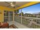 Relaxing screened porch with seating overlooking the lush greenery and community pool, perfect for unwinding at 2000 Bal Harbor Blvd # 321, Punta Gorda, FL 33950