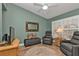 Relaxing sitting area with comfortable chairs and a view of the outside at 2000 Bal Harbor Blvd # 321, Punta Gorda, FL 33950