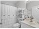 Charming bathroom with a toilet, shower, and vanity at 24004 Vincent Ave, Punta Gorda, FL 33955