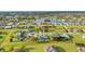 Aerial view showcasing the home's location in a residential neighborhood at 25151 Rosamond Ct, Punta Gorda, FL 33983