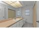 Bathroom with beige vanity, toilet and shower at 25373 Tether Ln, Punta Gorda, FL 33983
