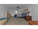 Main bedroom with king bed, dresser, and pool view at 25373 Tether Ln, Punta Gorda, FL 33983