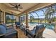 Relaxing screened pool area with patio furniture at 25373 Tether Ln, Punta Gorda, FL 33983