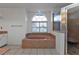 Bathroom with soaking tub, shower, and updated flooring at 25373 Tether Ln, Punta Gorda, FL 33983