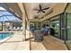 Screened patio with pool access and seating at 25373 Tether Ln, Punta Gorda, FL 33983