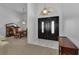 Bright entryway with double doors leading into the dining and living areas at 25373 Tether Ln, Punta Gorda, FL 33983