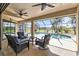 Relaxing screened pool area with patio furniture at 25373 Tether Ln, Punta Gorda, FL 33983