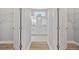 View into the spacious walk-in closet, providing ample storage with white wire shelving at 2643 Rushmore St, North Port, FL 34288