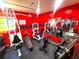 Home gym with exercise equipment and weights at 301 Country Club Way, Venice, FL 34285
