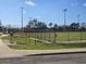 Another baseball field with lights, and dugouts at 301 Country Club Way, Venice, FL 34285