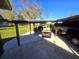 Covered carport with space for two vehicles at 301 Country Club Way, Venice, FL 34285