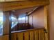 Enclosed outdoor shower with wooden frame and privacy gate at 301 Country Club Way, Venice, FL 34285