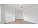 Spacious bedroom with double doors and ample closet space at 3705 Baynes Rd, North Port, FL 34288