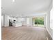 Open concept kitchen with island and stainless steel appliances at 3705 Baynes Rd, North Port, FL 34288