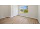 Bedroom features a window with a view, and ample closet space, providing a comfortable and private retreat at 3779 Clearfield St, North Port, FL 34286