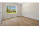 Well-lit bedroom with a large window, creating a bright and airy ambiance for rest and relaxation at 3779 Clearfield St, North Port, FL 34286
