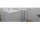 Laundry area equipped with modern appliances, offering convenience and efficiency for household chores at 3779 Clearfield St, North Port, FL 34286