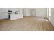 Bright open living space seamlessly connecting the living room and kitchen, perfect for entertaining guests at 3779 Clearfield St, North Port, FL 34286