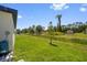 Expansive backyard features lush greenery and provides a serene view of the surrounding nature at 3802 Eagle Pass St, North Port, FL 34286