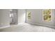 Bright bedroom with modern flooring and a view of the outdoors from its two large windows at 3883 Dominic St, North Port, FL 34288