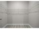 Walk-in closet with installed shelving providing optimal storage at 3883 Dominic St, North Port, FL 34288