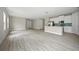 Open-concept living area highlighting neutral tones, ample natural light, and modern finishes and fixtures at 3883 Dominic St, North Port, FL 34288