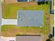 Top-down aerial shot highlights a modern home with a large yard and well-maintained landscape at 4131 Bula Ln, North Port, FL 34287